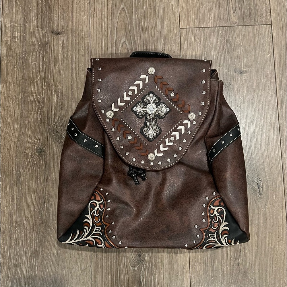 Brown Leather Backpack with Embellishments